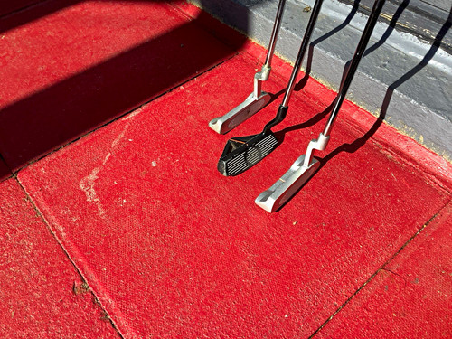 Lot golf putters and a - of,