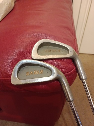 Eagle and iron golf clubs - and, 4